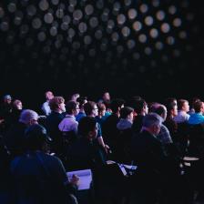 Auditorium of people by Headway on Unsplash