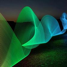 Green and blue color waves against a black background.