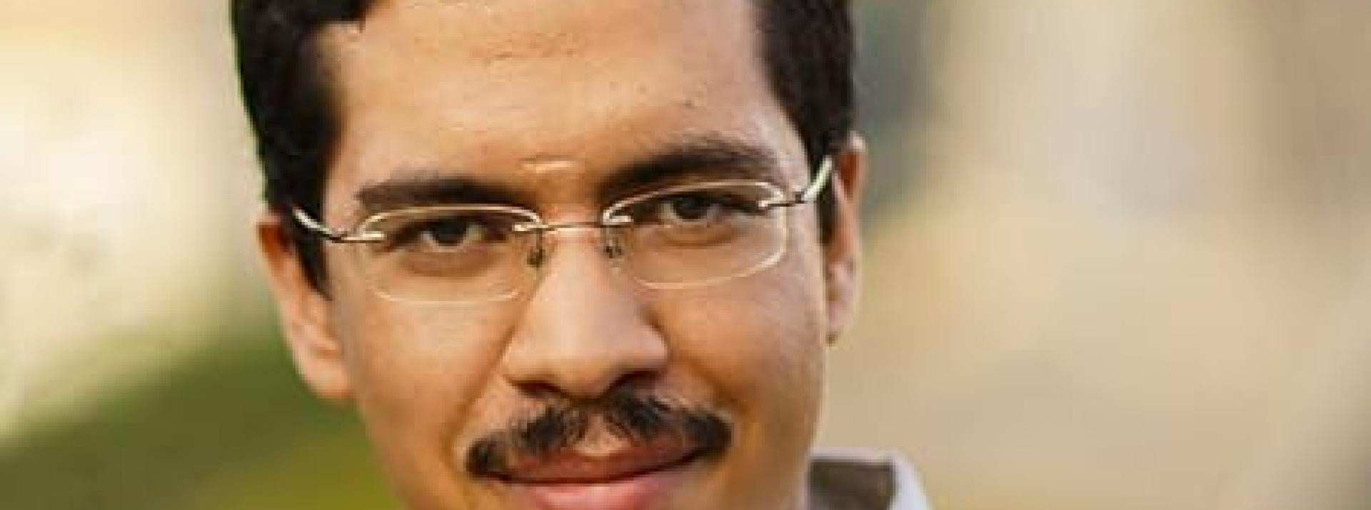 headshot photograph of speaker