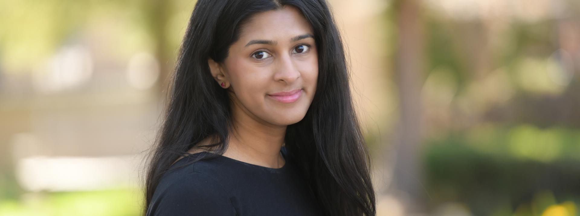 headshot photograph of Shazeda Ahmed in front of trees