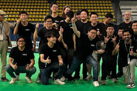 A group photo of RoboCup Soccer World Champions