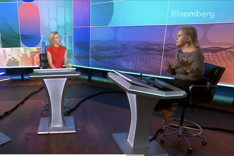 UCLA Professor Safiya Noble wearing cafe au lait-colored dress in the studio with presenters Carolyn Hyde and Ed Ludlow