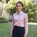 Noopur Raval, Assistant Professor, Department of Information Studies, in pink shirt and black pants